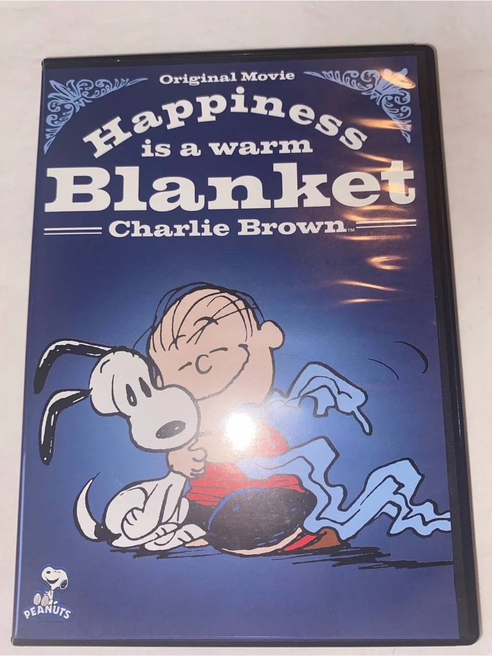 2 Snoopy/Peanuts DVD’s
